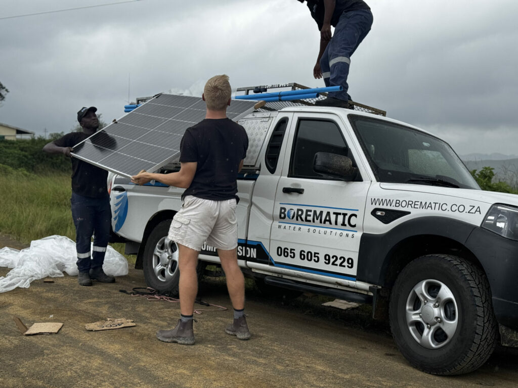 Solar-powered water pump installed near a farm